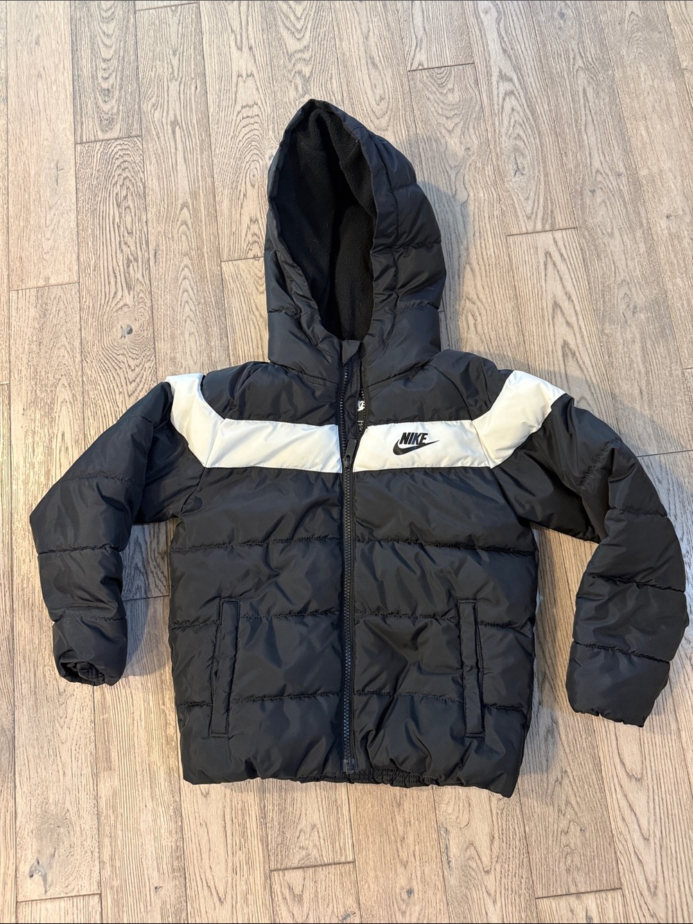 Nike Kids Black Puffer Jacket with White Chest Stripe and Hood